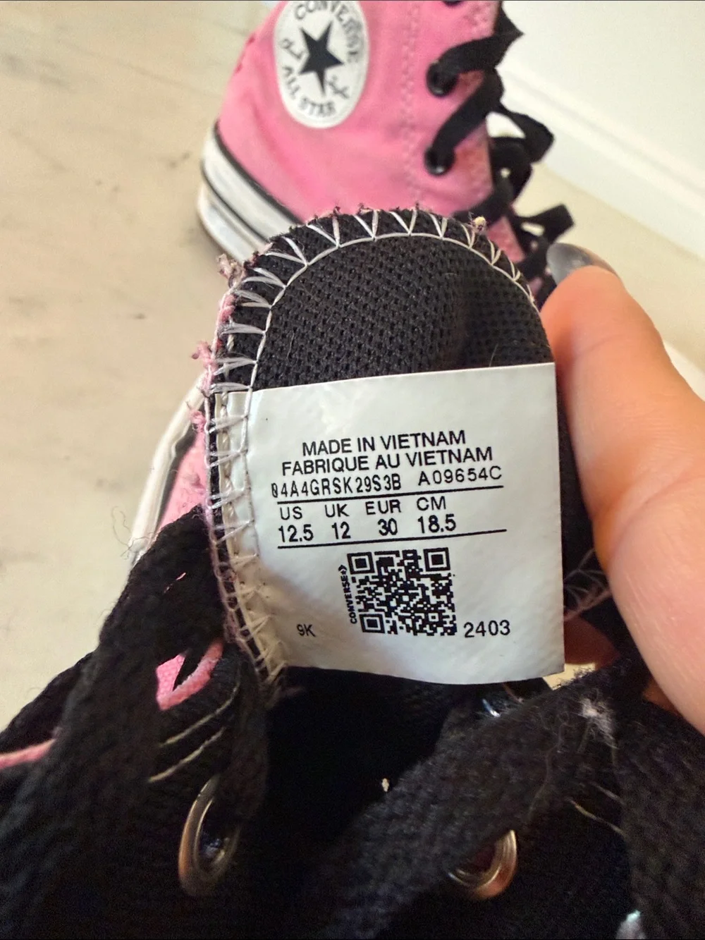 Converse Pink High-Top Canvas Sneakers with Black Accents
